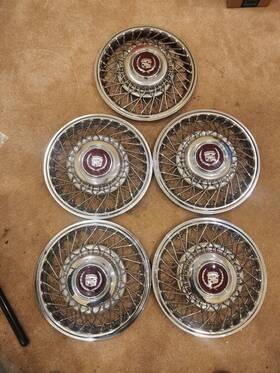 1631222 Gmc 5 86 To 88 Cadilac 14 Inch Wire Hub Caps For Fwd Deville. Stock No