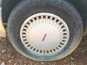 570-56516 Mazda Wheel Cover Hubcap 32-hole Type Fits 88-92 626 140415
