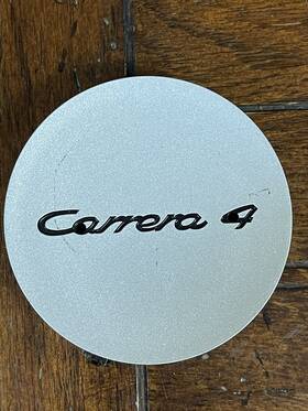 993.361.303.04 Porsche Carrera 4 Silver Center Cap