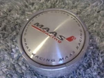 One Each Maas Racing Silver Center Wheel Cap #917K69A And #LG0611-12. Fixed Price $42.49.