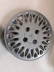 Mitsubishi Expo 1994-1998 14" 18 Hole Silver Wheel Cover / Hubcap 57572. Fixed Price $35.00.