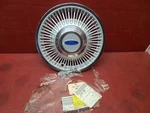 Nos New 1987-1990 Ford Taurus Wire Spoke 15" Hubcap Wheel Cover E7DC-1000-AA. Fixed Price $40.00.