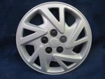 Pontiac Sunfire 00-05 14" Split Spoke Silver Wheel Cover 5118 Oem. Fixed Price $55.00.