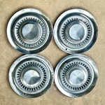 Vintage 1956 Pontiac Hubcaps Wheel Covers Star Chief, Chieftan, 14. Fixed Price $110.00.