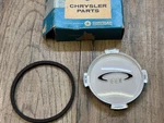 1964 Chrysler New Yorker Nos Body Mopar Wheel Cover Medallion 2525079. Fixed Price $95.00.
