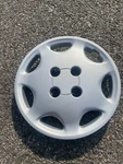 One 1993 94 Mitsubishi Mirage Dodge Colt Summit 13 Inch Hubcap Wheel Cover Mint. Fixed Price $26.40.