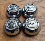 Mazda B2300 B2500 B3000 B4000 Center Cap Set Of 4, 1998-2008, P/n F57A 1A096 La. Fixed Price $59.95.
