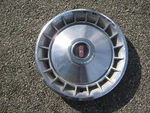 One Genuine 1965 Oldsmobile Cutlass F85 14 Inch Deluxe Hubcap Wheel Cover. Fixed Price $30.80.