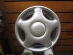 1995-1997 Subaru Impreza 15" Twist On Hubcap / Wheel Cover New Old Stock. Fixed Price $25.00.