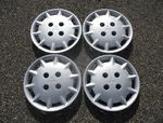 Genuine 1992 1993 Mitsubishi Galant 14 Inch Hubcaps Wheel Covers Silver. Fixed Price $66.00.