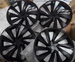 Kavanic 4-PIECE Matte Black Wheel Covers / Hubcaps. Fixed Price $145.00.