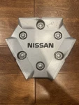 1987-1993 Nissan Pathfinder Hardbody Center Hubcap 40315-32G10. Fixed Price $75.00.