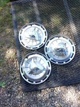 Set Of Three 1962 Chevrolet Impala Red White Blue Spinner Hubcaps Wheel Covers. Fixed Price $160.00.