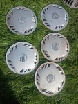 1989-1991 14" Mercury Sable Oem Hubcaps Of 5 (set 1). Fixed Price $100.00.