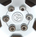 2005 - 2014 Toyota Tacoma Machined Center Cap (42603AD070). Fixed Price $50.00.