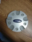 (1) Ford Focus Center Cap 98AB-1130-CB. Fixed Price $28.00.