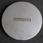 Mazda Oem Wheel Center Hub Cap B461-37-19X 6.125". Fixed Price $19.80.