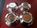 Vintage Nos 1973-77 Chevy Impala Caprice Dog Dish Poverty Hubcaps Wheel Covers. Fixed Price $500.00.