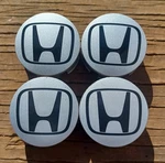 Honda Civic Fit Insight Center Cap Set Of 4, 2002-2014 Part # 44732 S5A 0000 A1. Fixed Price $49.95.