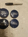Set Of (4) Four Ford Fusion Focus Fiesta Escape Edge Oem Center 6M21-1003-AA. Fixed Price $16.00.