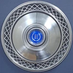 One '75-89 Ford Crown Victoria 734R 15" Lace Design Hubcap Wheel Cover Blue Logo. Fixed Price $49.99.