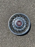 One 1986 To 1992 Cadillac Fleetwood Brougham Wire Spoke Locking Hubcap Scratch. Fixed Price $76.50.