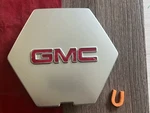 #u (1) 2004-2007 Gmc Envoy Silver Oem Center Cap 9594597. Fixed Price $39.95.