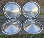 Set Of Factory 1957 Plymouth Fury Belvedere 14" Hubcaps Wheel Covers Original. Fixed Price $80.00.