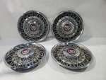1988 1992 Cadillac Brougham Oem Set Of 4 Wheel Covers With Tool Shows Wear. Fixed Price $450.00.