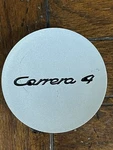 Porsche Carrera Silver Center Cap 993.361.303.04. Fixed Price $29.99.