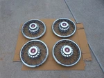 Wheel Covers Set Of 4 Nos Oem 13" Wire Type Hub Caps 1982-86 Oldsmobile Fwd. Fixed Price $129.90.