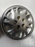 Saturn Series 02-05 12 Slot Hubcap Wheelcover. Fixed Price $34.99.
