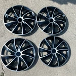 Winjet WJ-5084-14 Black & Silver Wheel Covers Hubcaps Set Snap-on. Fixed Price $34.99.