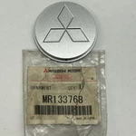 Mitsubishi Spacewagon Runner Silver Alloy Wheel 1X Centre Cap Genuine MR133768. Fixed Price $32.52.