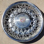 Vintage Cadillac Wire Spoke Logo Hubcap 16725 253786 1975-1985. Fixed Price $59.99.