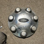 Ford F150 F250 Wheel Center 98 99 00 01 02 03 04 F75A-1A096-AD Hubcap Lug. Fixed Price $55.00.