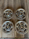 1965 Pontiac Hubcaps 14" Spinners Set Of 4, Wheel Covers Gto Tempest Lemans. Fixed Price $225.00.
