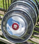 Set 1967-1978 Cadillac Eldorado Wheel Covers Hubcaps Shiny & Sharp Red Emblems. Fixed Price $1099.95.
