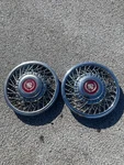 Genuine 1985 To 1988 Cadillac Deville Wire Spoke 14 Inch Bang On Hubcaps. Fixed Price $66.00.