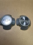 Nos 1985 To 1988 Chevy Nova Center Hubcaps Pair. Fixed Price $29.00.
