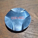 Gmc Envoy, Xl, Center Cap, 2006-2009 Part # 9595877 02 Damaged. Fixed Price $24.95.