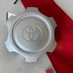 #r (1) 1995-2002 Toyota Tacoma 4RUNNER Center Cap Oem 42603-04030. Fixed Price $17.95.