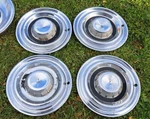 Set Of 1957 Chrysler New Yorker 14" Hubcaps Wheel Covers. Fixed Price $79.00.