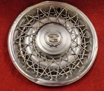 Deville, Fleetwood, Seville : 1975, 1976, 1977, 15" Factory Wire Style Hubcap. Fixed Price $70.00.