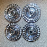 1963 Ford Thunderbird 14" Set Of Wheel Covers T-bird. Fixed Price $265.00.