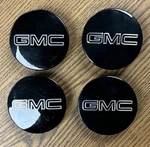 2 5/8" Gmc Acadia, Canyon Black Center Cap #84388508 Set. Fixed Price $139.99.