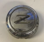 Nissan Oem Center Hub Cap Chrome 40343P0000. Fixed Price $36.00.