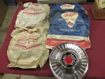 1955-56 Packard Clipper Hubcap Set 465076 Nos. Fixed Price $135.00.