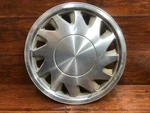 Plymouth Sundance : 1988, 1989, 1990, 14 Inch Factory Hubcap, # 04284682. Fixed Price $26.00.