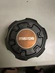 87 88 89 90 92 93 Mazda B-2600 Oem Center Hub Cap S23237191 64691. Fixed Price $40.00.